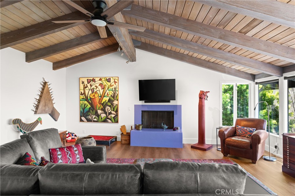 300 Emerald Bay Laguna Beach, CA 92651 - Photo 9 of 31 a living room with furniture and a fireplace