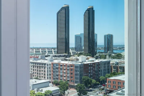 a kitchen with a sink cabinets and outdoor space