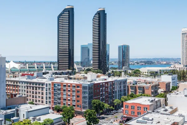 a view of city with tall buildings
