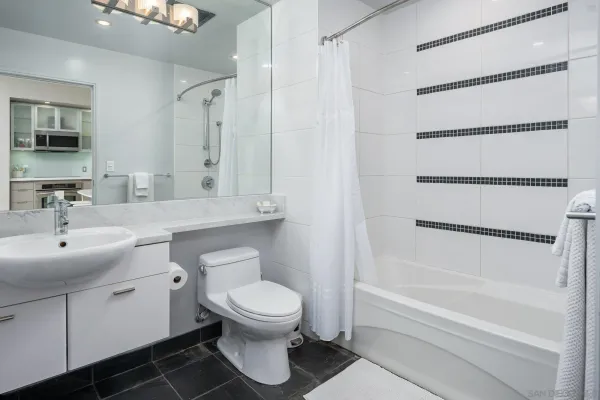 a bathroom with a toilet sink and a bathtub
