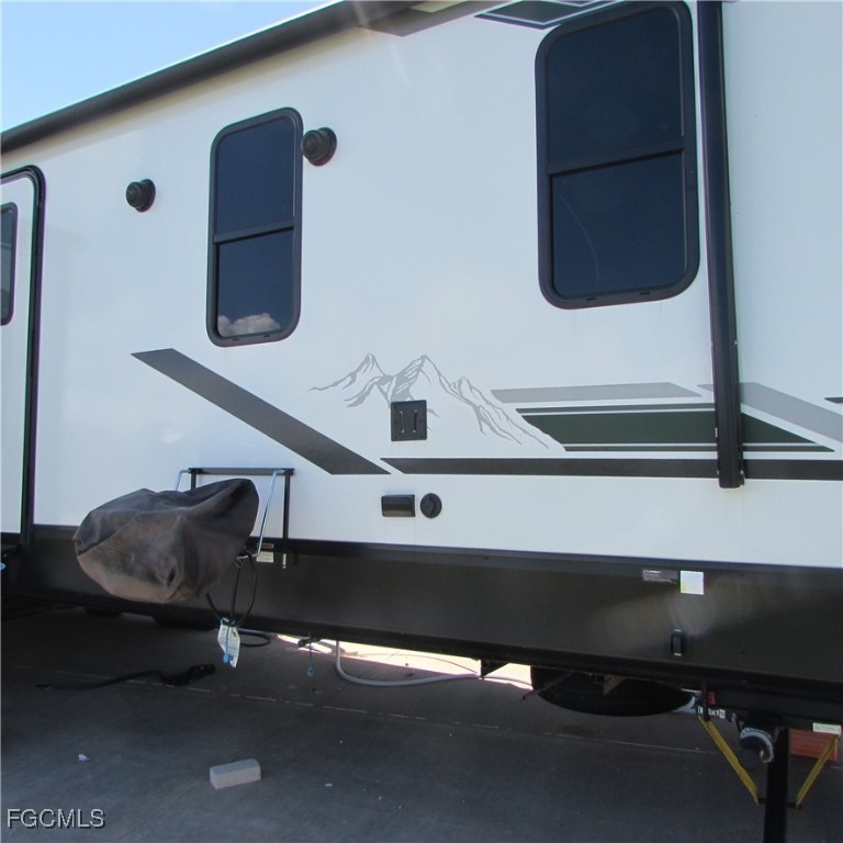 19681-313 Summerlin Road Fort Myers, FL 33908 - Photo 11 of 40 a bathroom with a sink and a mirror
