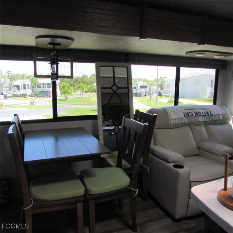 19681-313 Summerlin Road Fort Myers, FL 33908 - Photo 12 of 40 a view of a dining room with furniture window and outside view