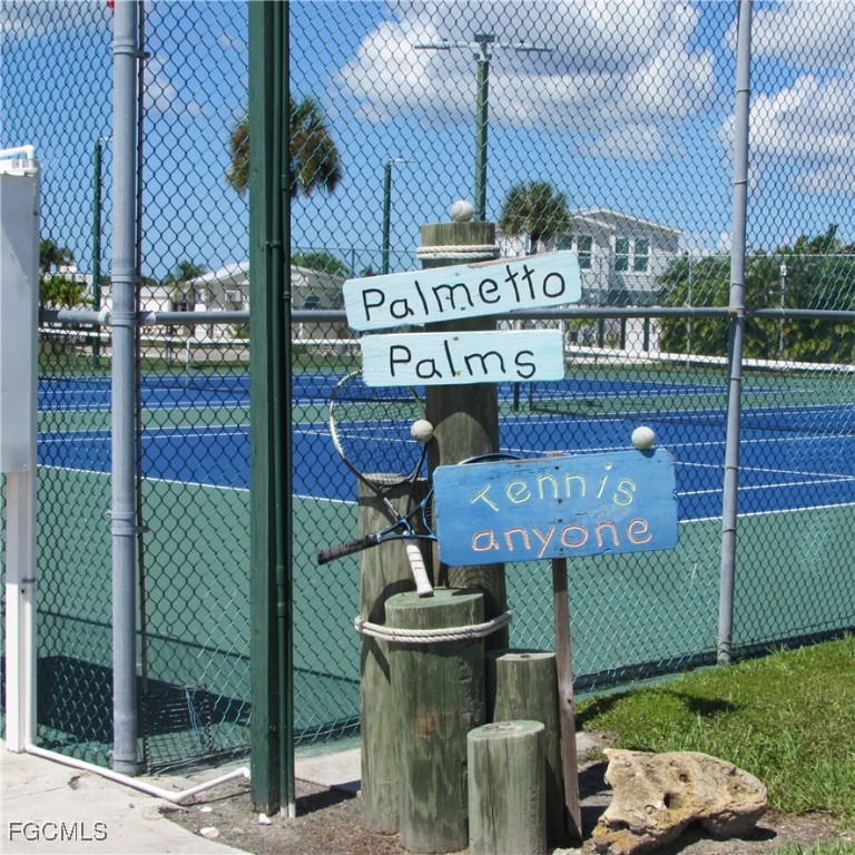 19681-313 Summerlin Road Fort Myers, FL 33908 - Photo 26 of 40 a view of a brick building with a sign on the wall