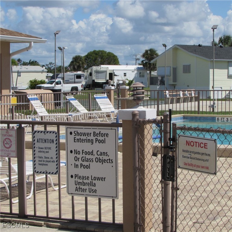 19681-313 Summerlin Road Fort Myers, FL 33908 - Photo 29 of 40 a front view of a building with glass windows