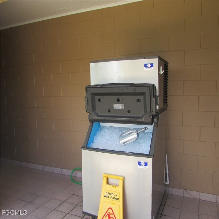 19681-313 Summerlin Road Fort Myers, FL 33908 - Photo 37 of 40 a utility room with washer and dryer