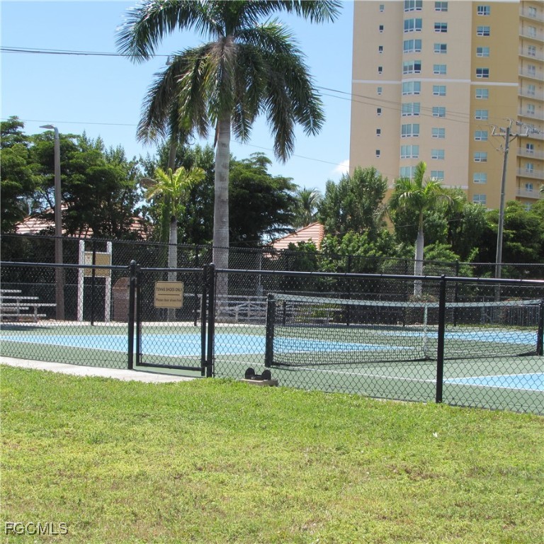 19681-313 Summerlin Road Fort Myers, FL 33908 - Photo 38 of 40 a view of swimming pool with palm trees