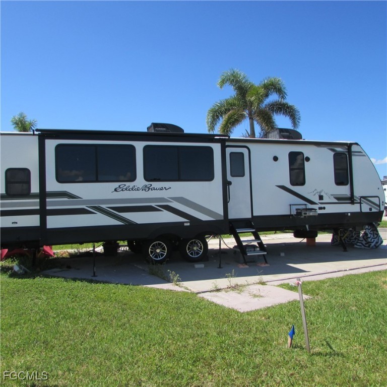 19681-313 Summerlin Road Fort Myers, FL 33908 - Photo 6 of 40 a view of a house with backyard