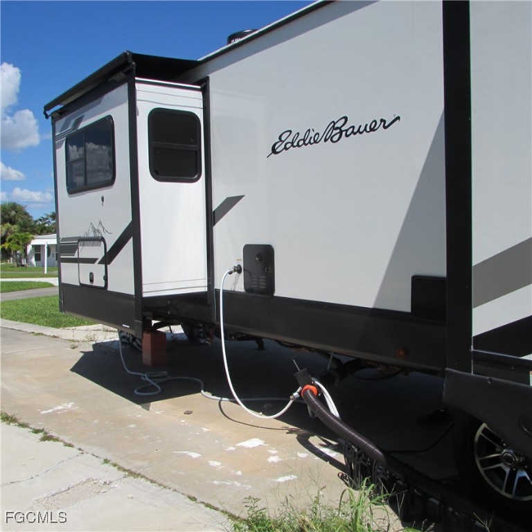 19681-313 Summerlin Road Fort Myers, FL 33908 - Photo 10 of 40 a living room with chairs