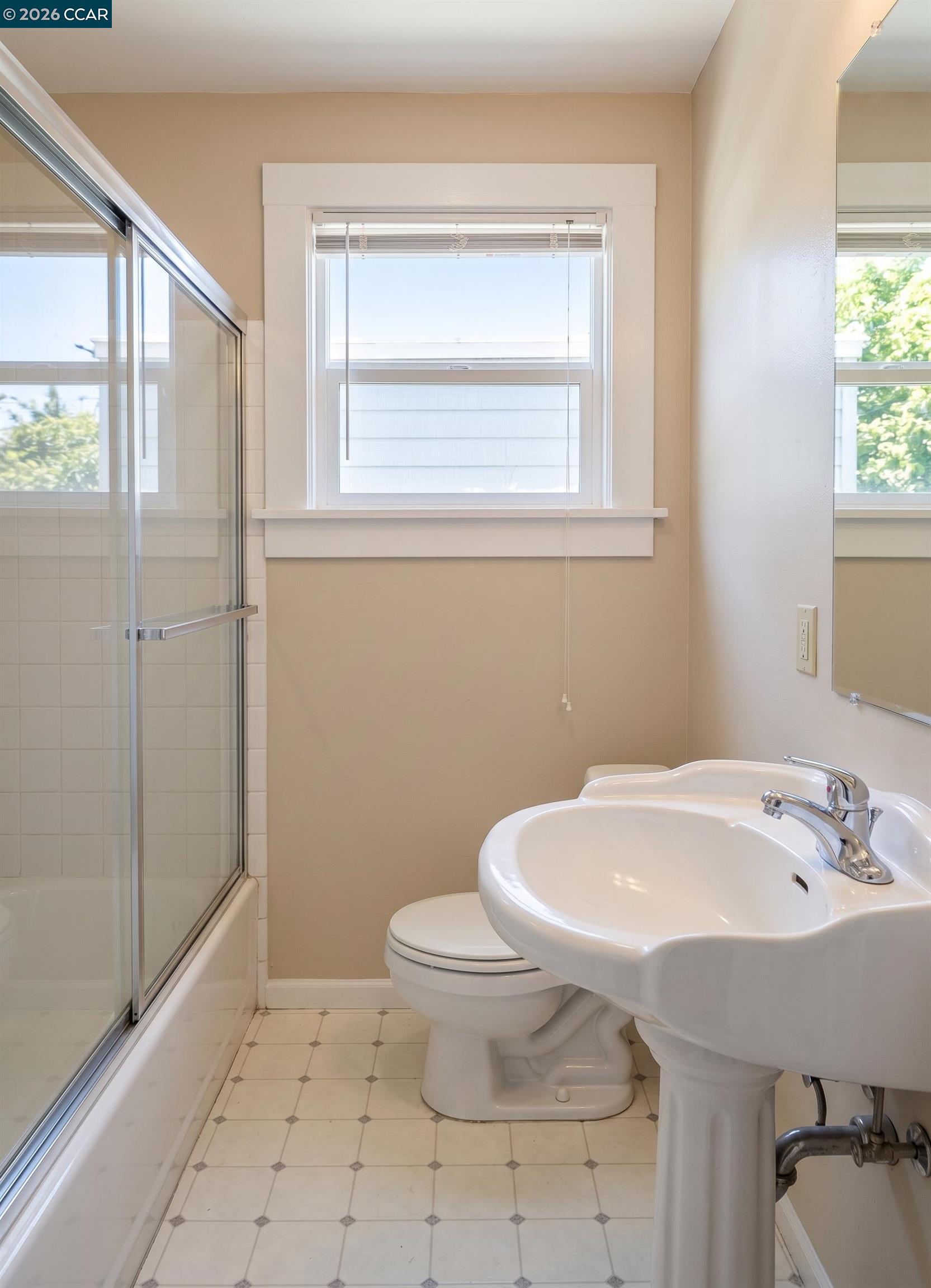 70 West Rose Bay Point, CA 94565 - Photo 4 of 8 a bathroom with a sink a toilet and shower