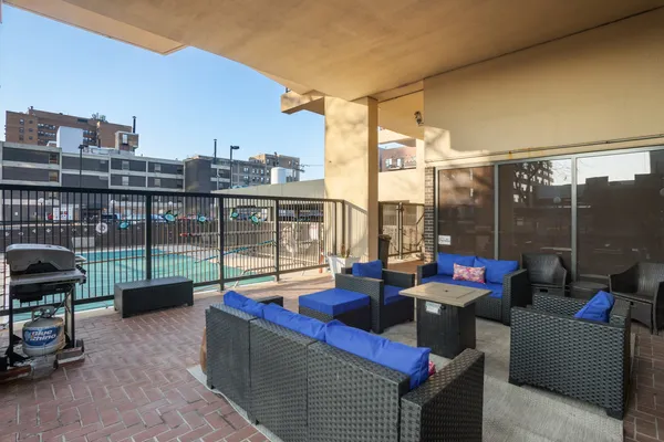 a view of roof deck with couch