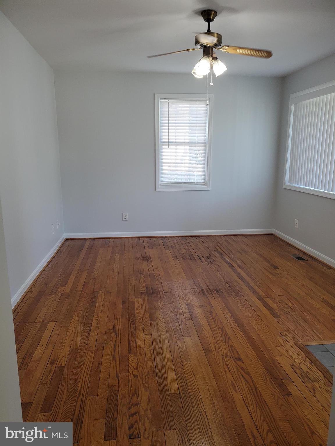 64 Riverside Road Essex, MD 21221 - Photo 11 of 30 Living Room with Hardwood Floors