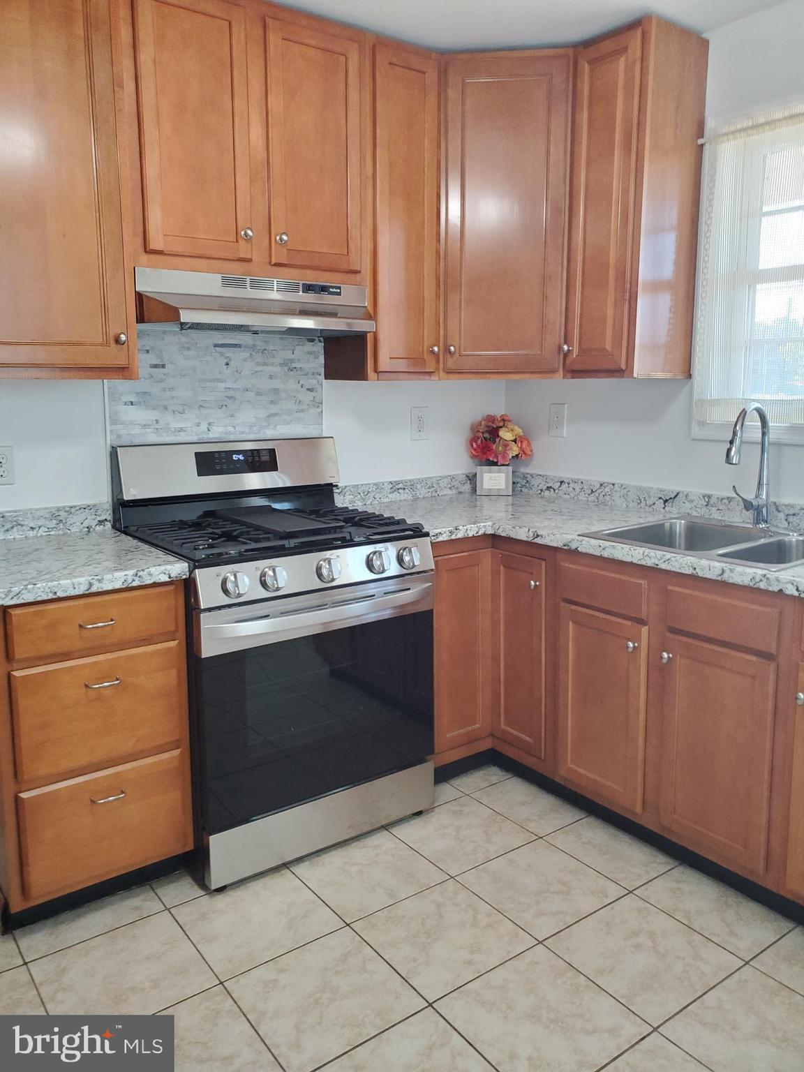 64 Riverside Road Essex, MD 21221 - Photo 12 of 30 Renovated Kitchen with Maple Cabinets