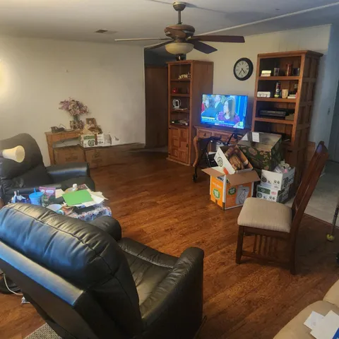a view of balcony with furniture