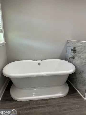 a bathroom with a bathtub
