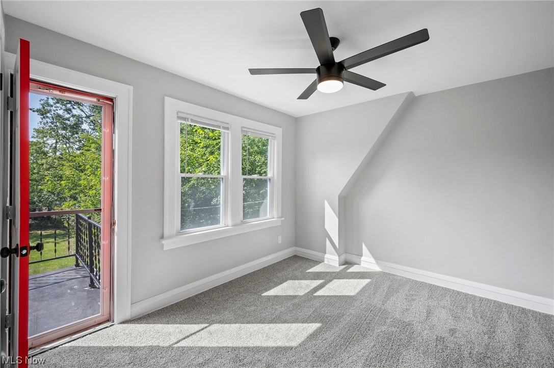 1022 Englewood Road Cleveland, OH 44121 - Photo 24 of 33 Empty room featuring ceiling fan and light carpet