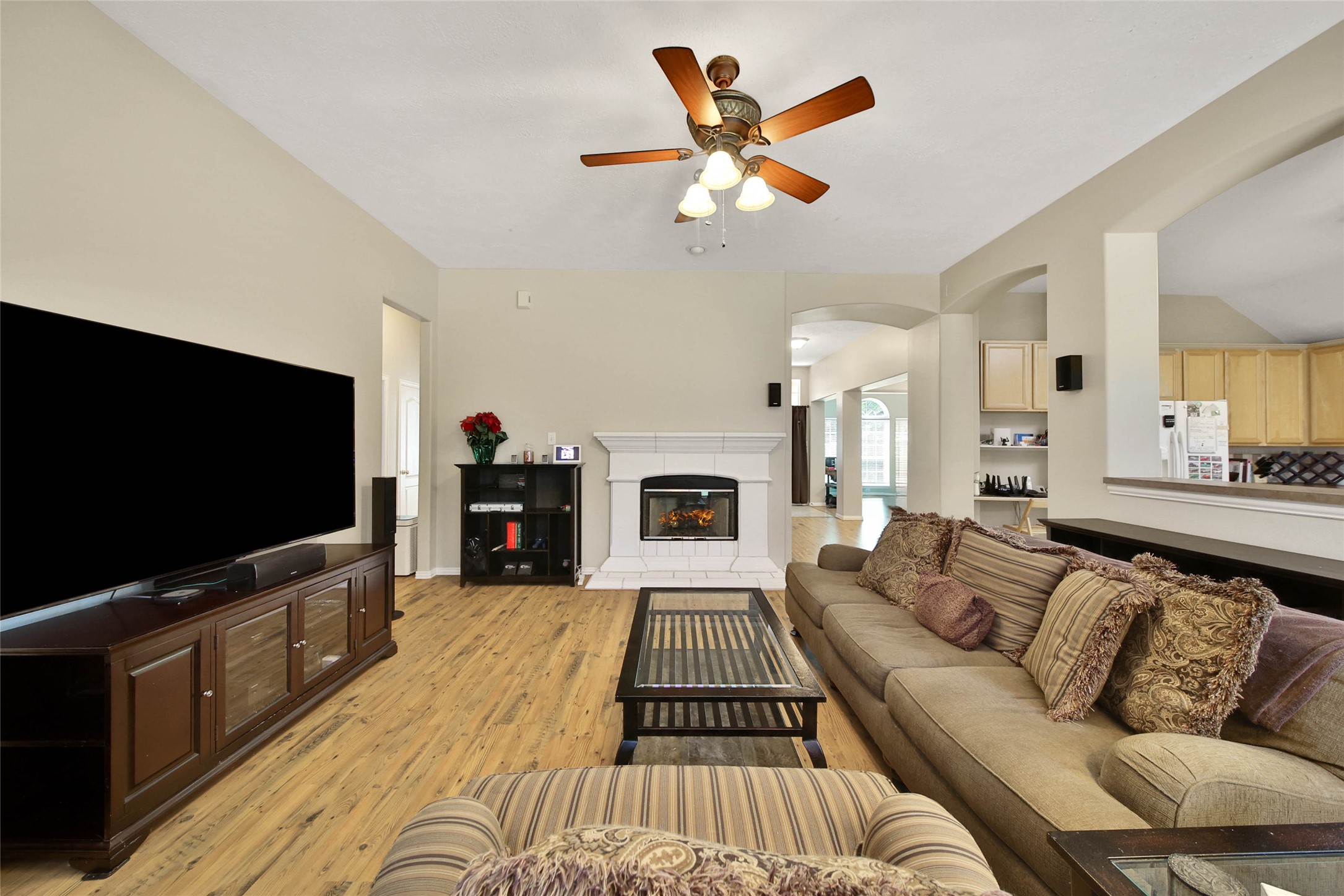 21338 Timber Pines Drive Spring, TX 77388 - Photo 10 of 29 a living room with furniture and a flat screen tv