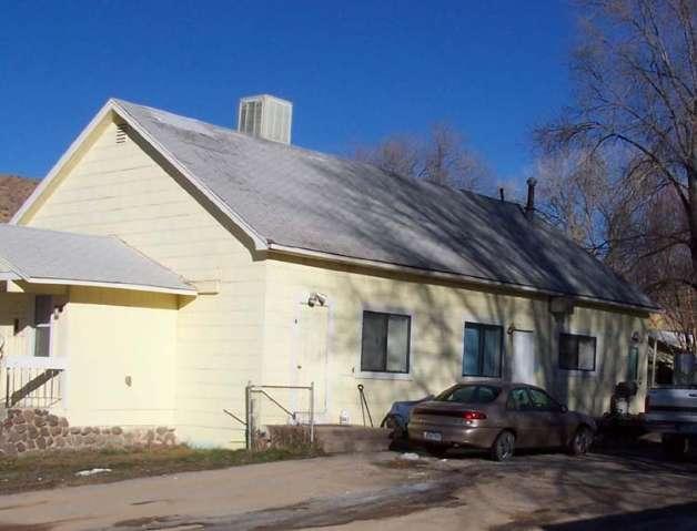 124 Daniel Rifle, CO 81650 - Photo 1 of 1 a front view of a building with cars parked