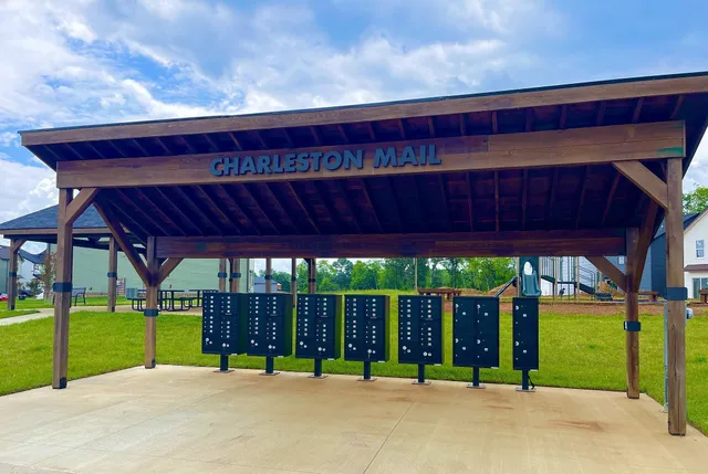 a view of swimming pool with a patio