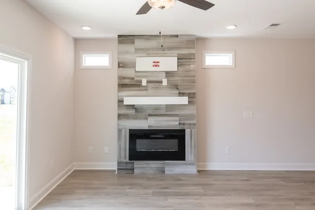 a view of kitchen with a sink and a stove