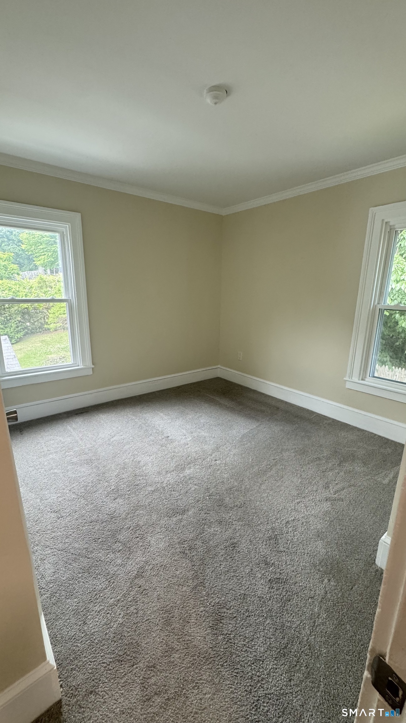 104 Prospect Street Ansonia, CT 06401 - Photo 23 of 40 an empty room with a window