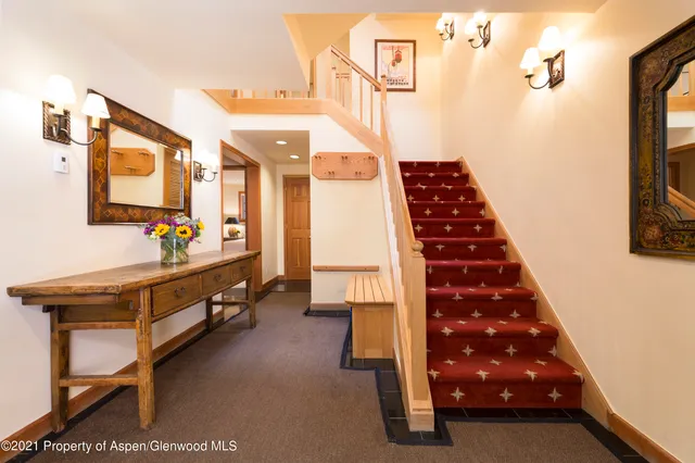 a bed room with a bed and wooden floor