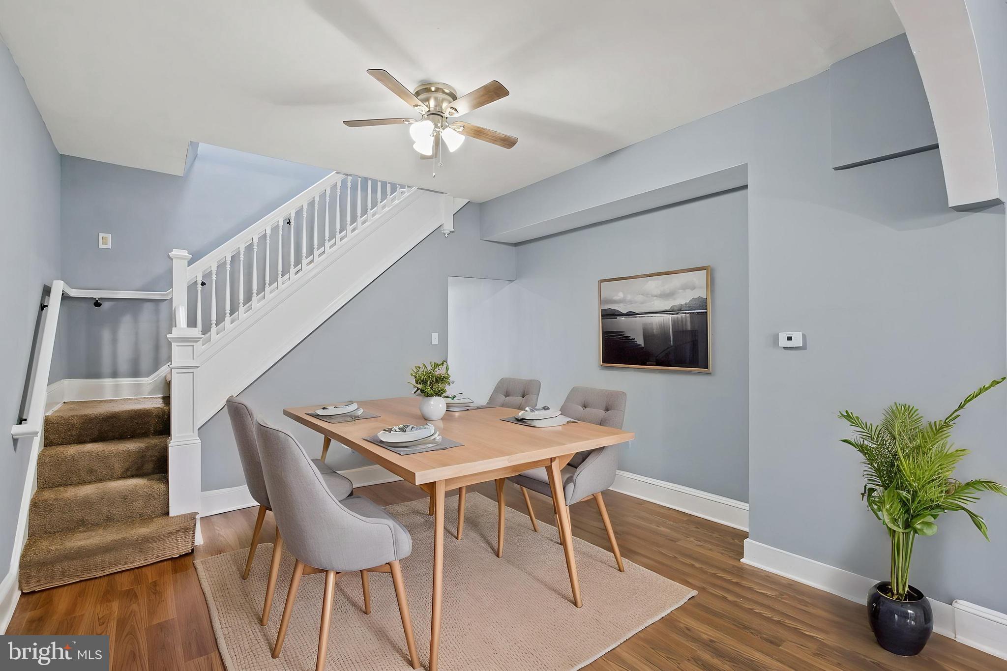 2811 Erdman Avenue Baltimore, MD 21213 - Photo 5 of 17 a view of a livingroom with furniture and wooden floor