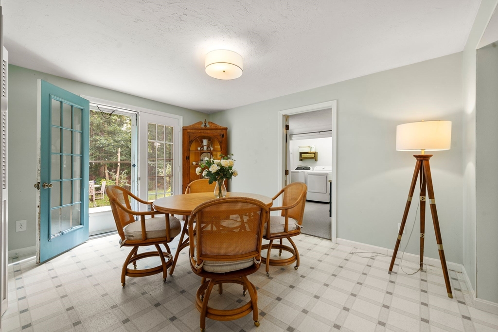 5 Cardinal Road Sandwich, MA 02563 - Photo 19 of 41 a view of a dining room with furniture and a window