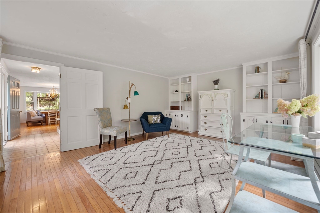 5 Cardinal Road Sandwich, MA 02563 - Photo 26 of 41 a bedroom with a bed and wooden floor