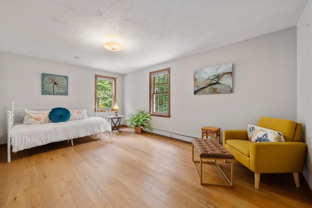 5 Cardinal Road Sandwich, MA 02563 - Photo 4 of 41 a living room with furniture and wooden floor