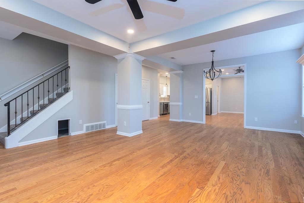 1227 Isle View Drive Memphis, TN 38103 - Photo 5 of 37 a view of empty room with a ceiling fan