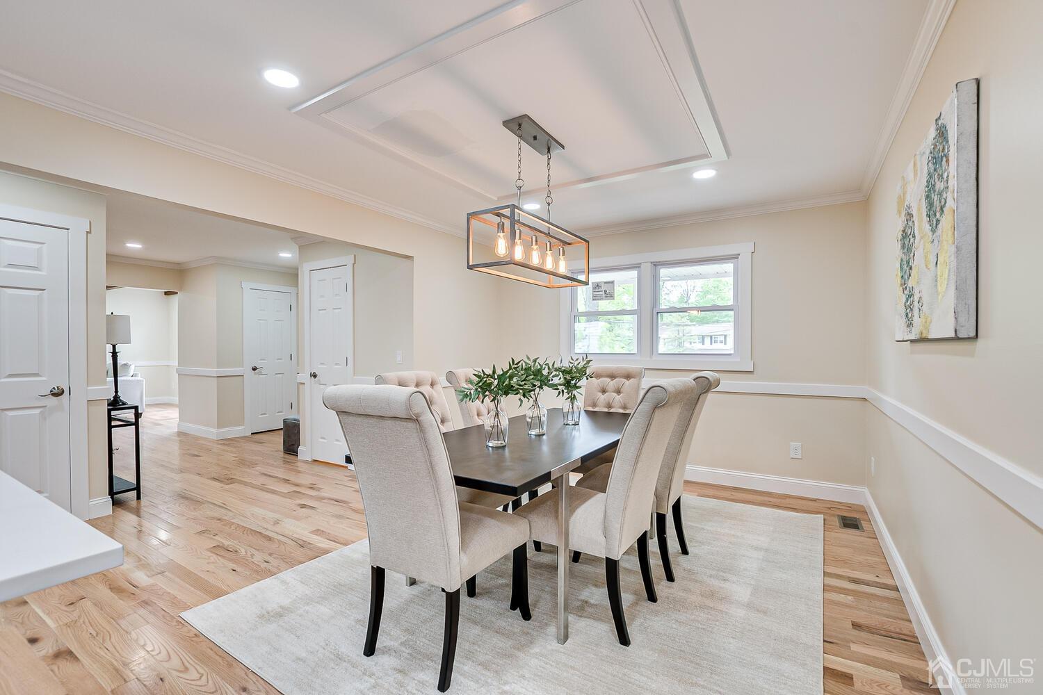 2 Devon Road Edison, NJ 08820 - Photo 29 of 69 a view of a dining room with furniture window and wooden floor