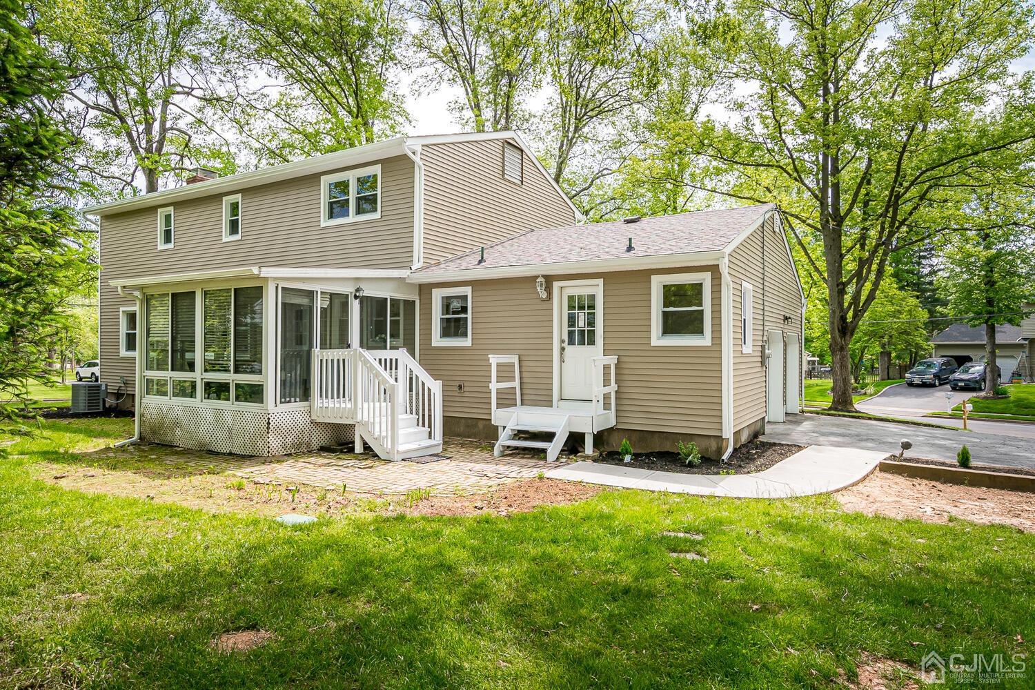 2 Devon Road Edison, NJ 08820 - Photo 64 of 69 a view of a house with backyard porch and sitting area