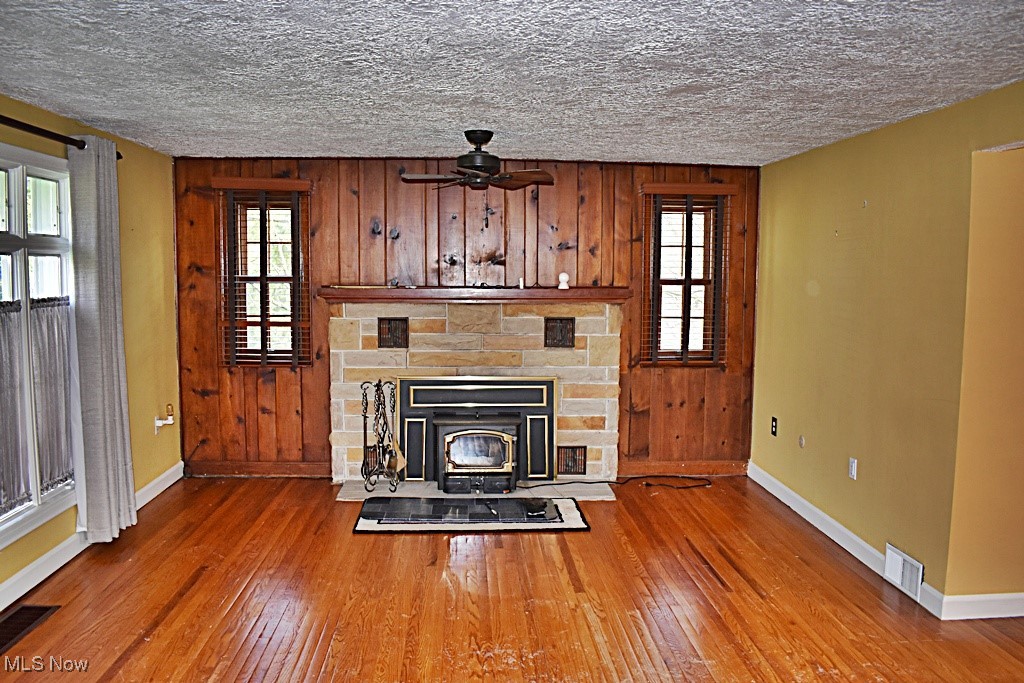 17600 Egbert Road Bedford, OH 44146 - Photo 9 of 49 Living Room and Fireplace feature wall. Fireplace with blower / insert valued at $2,500.