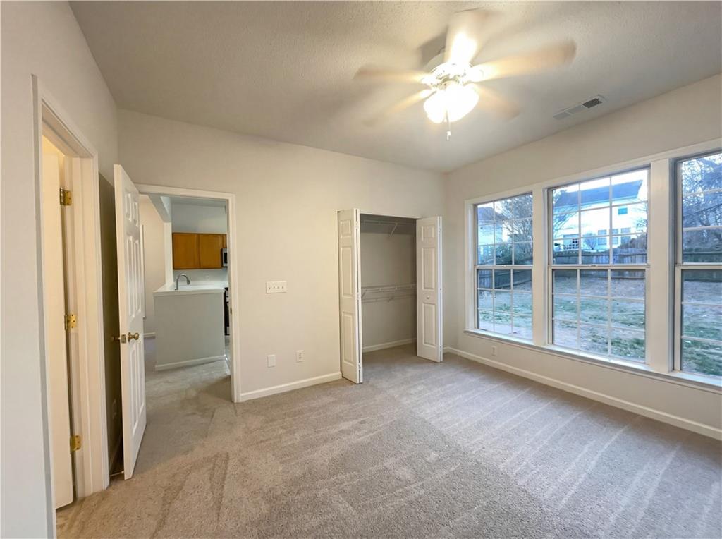 1639 Woodsford Road Kennesaw, GA 30152 - Photo 13 of 31 a view of an empty room with a window