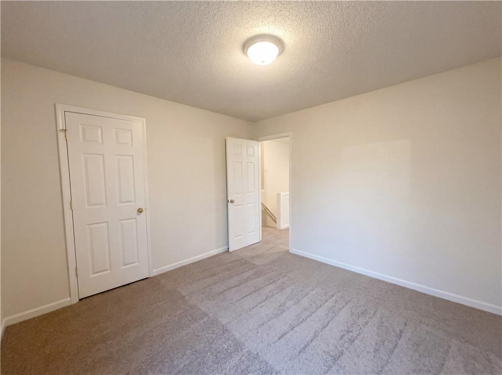 1639 Woodsford Road Kennesaw, GA 30152 - Photo 20 of 31 a view of an empty room