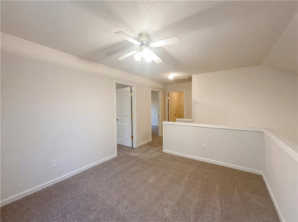 1639 Woodsford Road Kennesaw, GA 30152 - Photo 22 of 31 a view of an empty room with a window