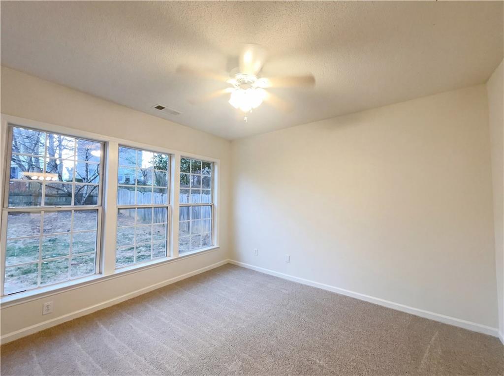 1639 Woodsford Road Kennesaw, GA 30152 - Photo 4 of 31 a view of an empty room with a window