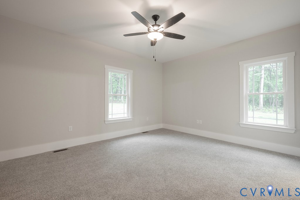 1 Tabscott Road Kents Store, VA 23084 - Photo 24 of 42 Spacious room featuring neutral carpeting, light g