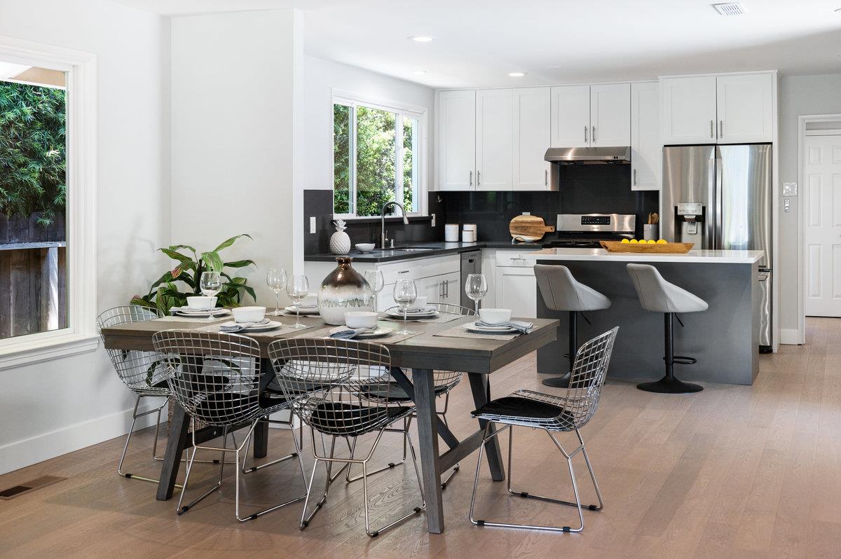 545 Alhambra Road San Mateo, CA 94402 - Photo 16 of 59 a view of a dining room with furniture window and wooden floor