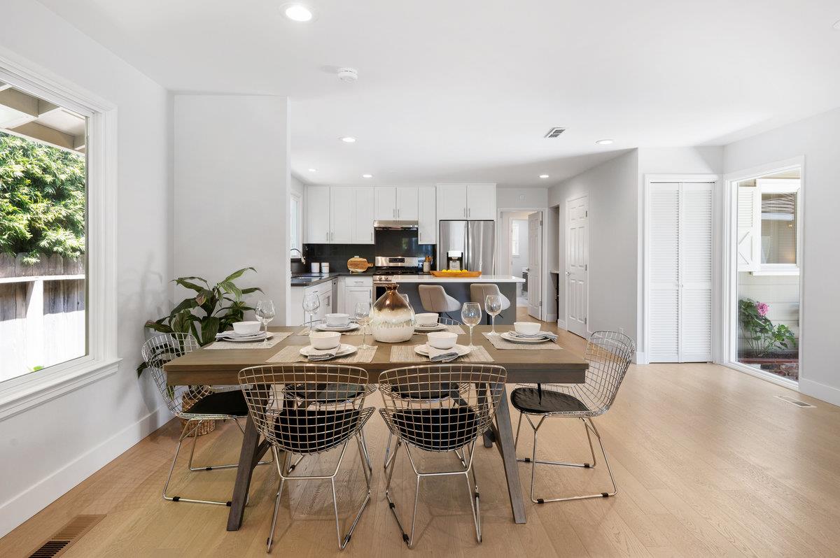 545 Alhambra Road San Mateo, CA 94402 - Photo 17 of 59 a view of a dining room with furniture and a window