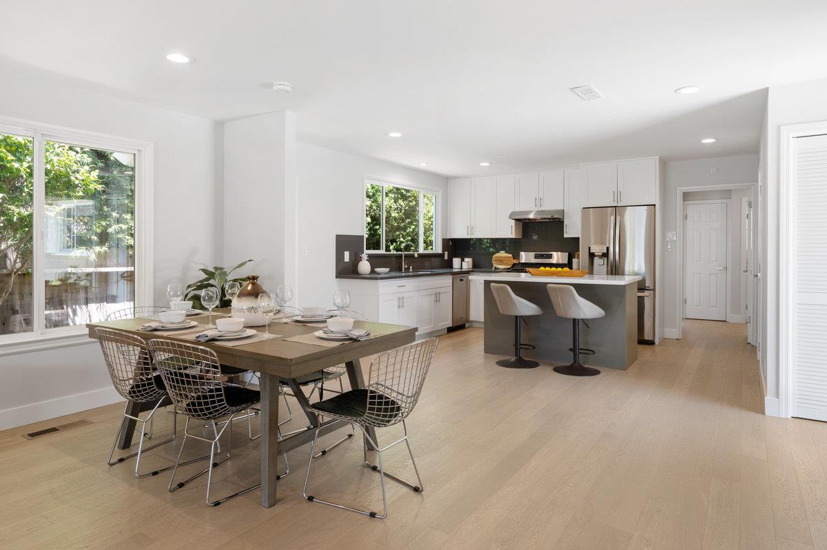 545 Alhambra Road San Mateo, CA 94402 - Photo 18 of 59 a view of a dining room with furniture and a large window