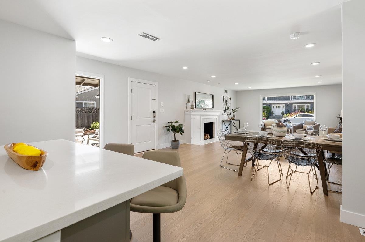 545 Alhambra Road San Mateo, CA 94402 - Photo 22 of 59 a view of a dining room with furniture and wooden floor