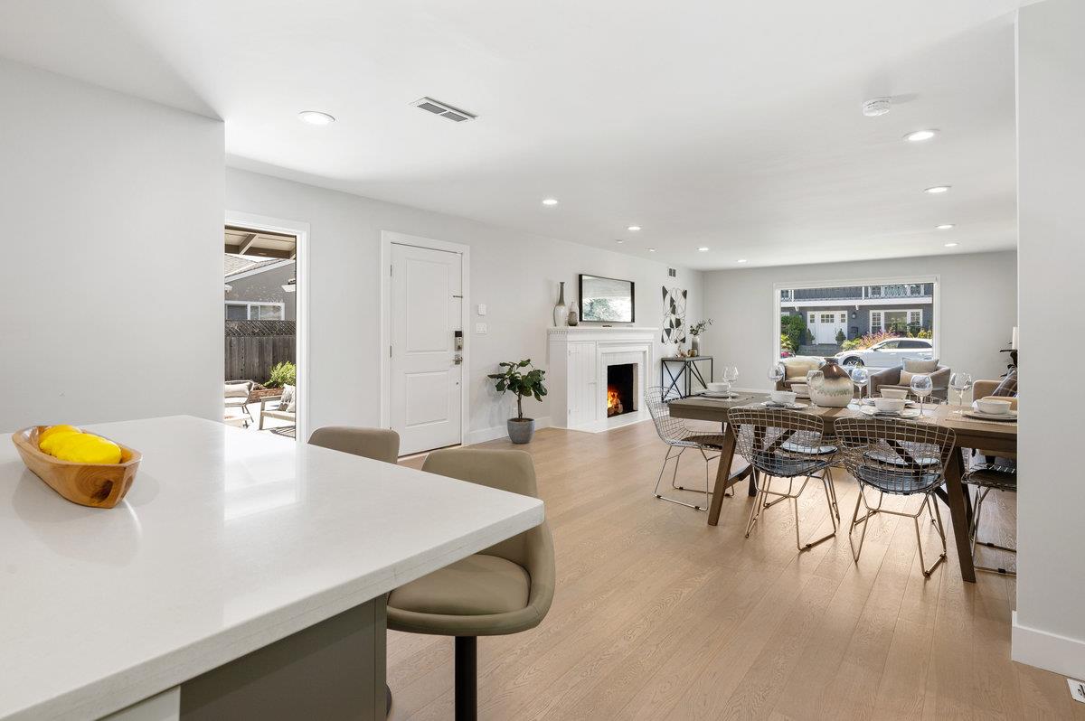 545 Alhambra Road San Mateo, CA 94402 - Photo 23 of 59 a view of a dining room with furniture and wooden floor