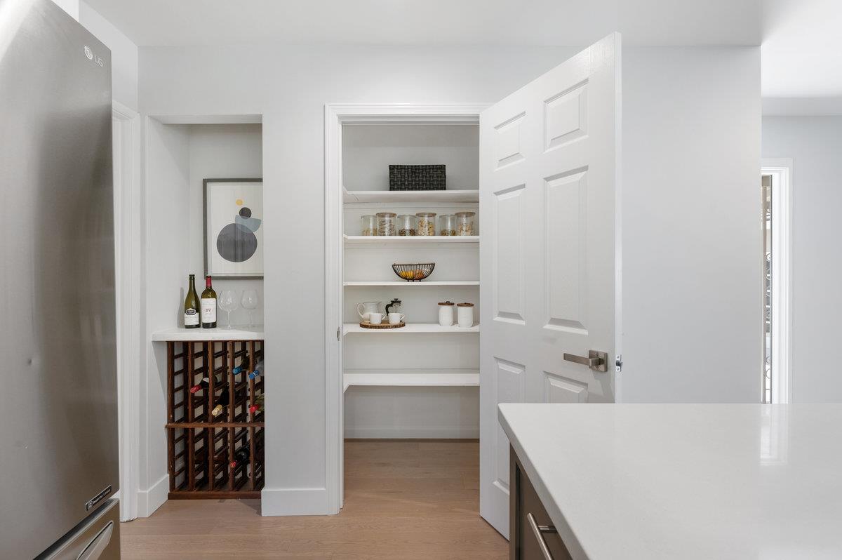 545 Alhambra Road San Mateo, CA 94402 - Photo 26 of 59 a bathroom with a bathtub sink and mirror
