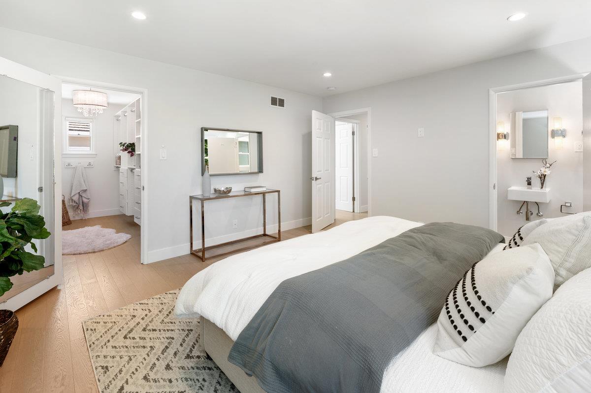 545 Alhambra Road San Mateo, CA 94402 - Photo 32 of 59 a bedroom with a bed and a couch