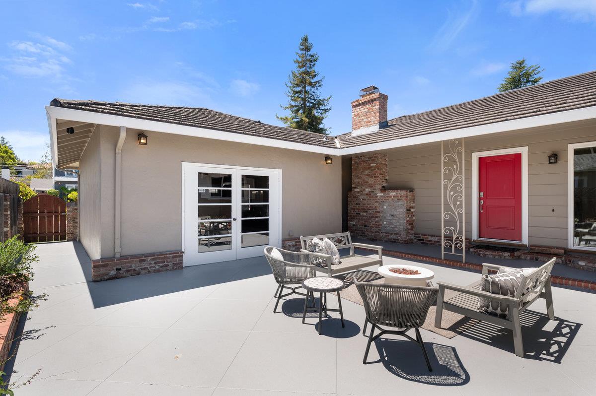 545 Alhambra Road San Mateo, CA 94402 - Photo 41 of 59 a view of a dinning table and chairs in the patio