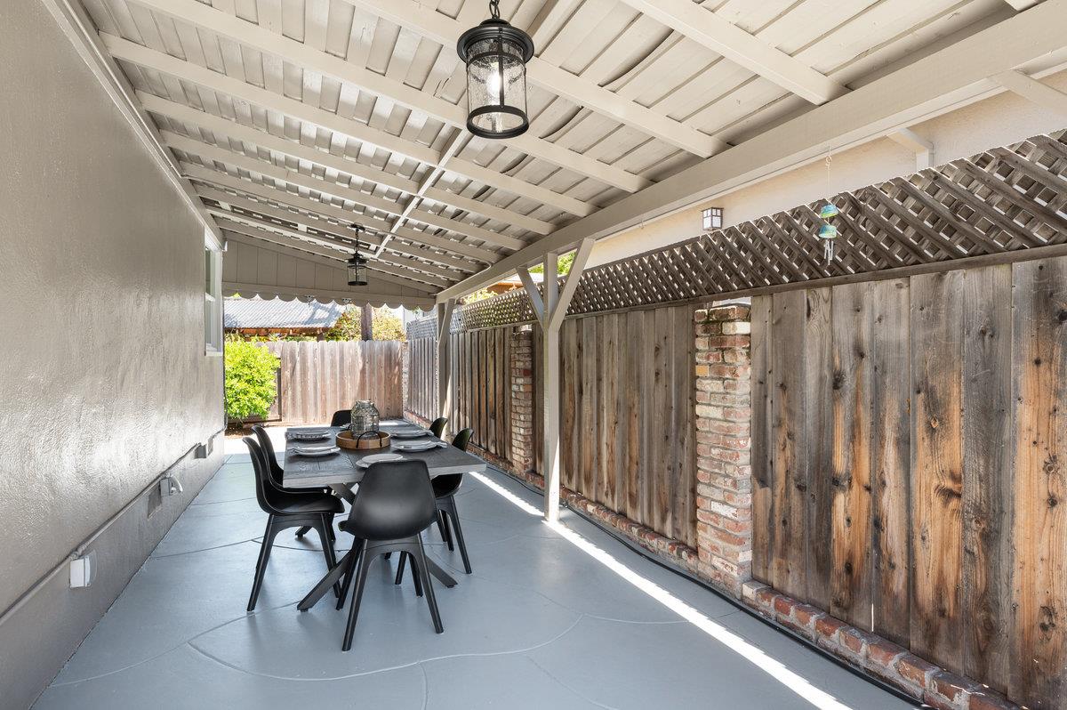 545 Alhambra Road San Mateo, CA 94402 - Photo 42 of 59 a view of a dining room with furniture window and outside view