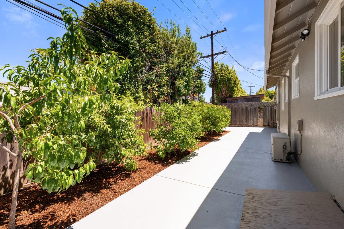545 Alhambra Road San Mateo, CA 94402 - Photo 44 of 59 a view of a pathway with a back yard