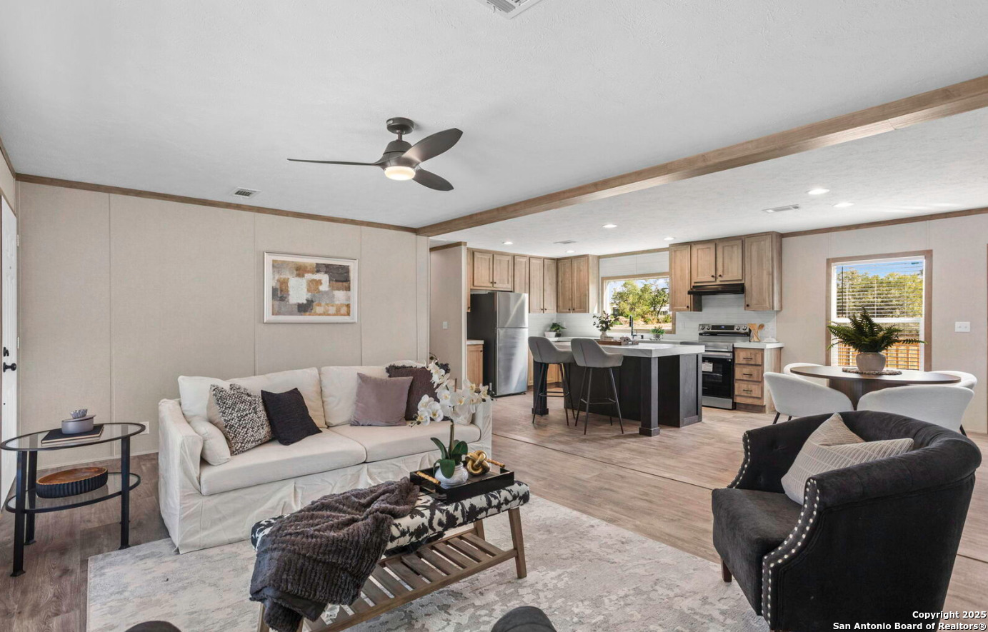 Tbd County Road 769 Devine, TX 78016 - Photo 8 of 12 a living room with furniture kitchen view and a potted plant