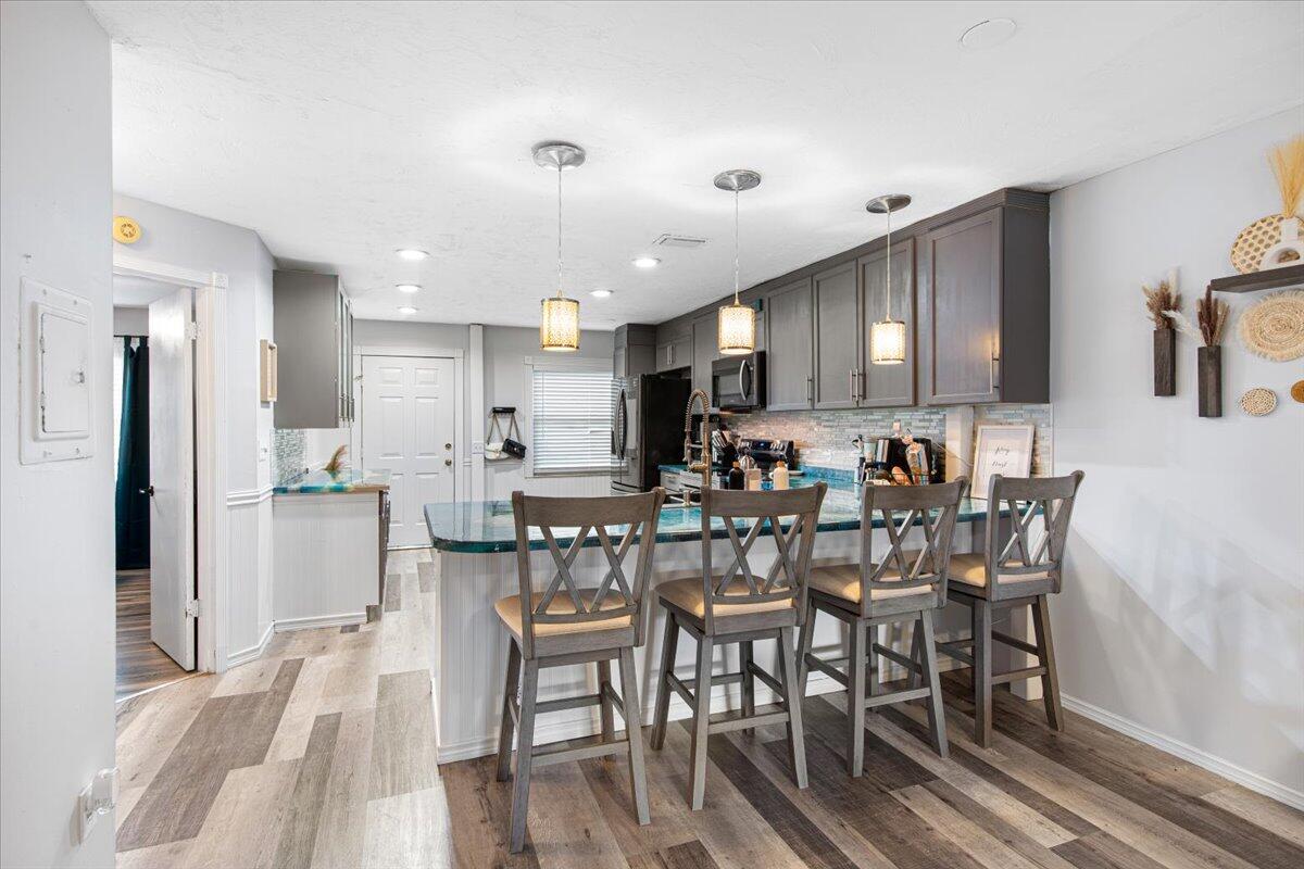 6006 Indrio Road, Unit 7 Fort Pierce, FL 34951 - Photo 8 of 31 a view of a dining room with furniture